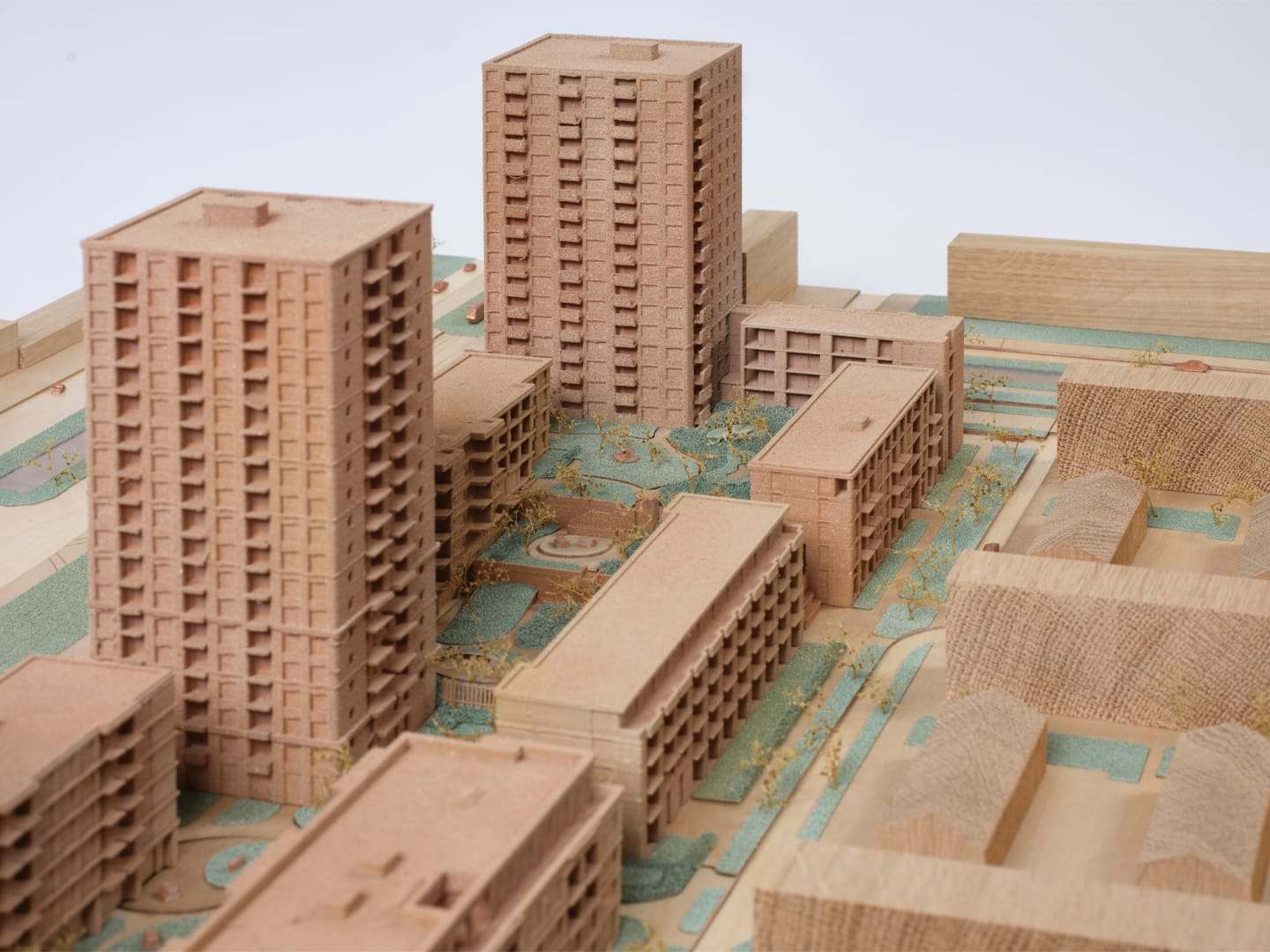 1:200 competition model of De Vonk: oak housing blocks and a tower on a green landscape base