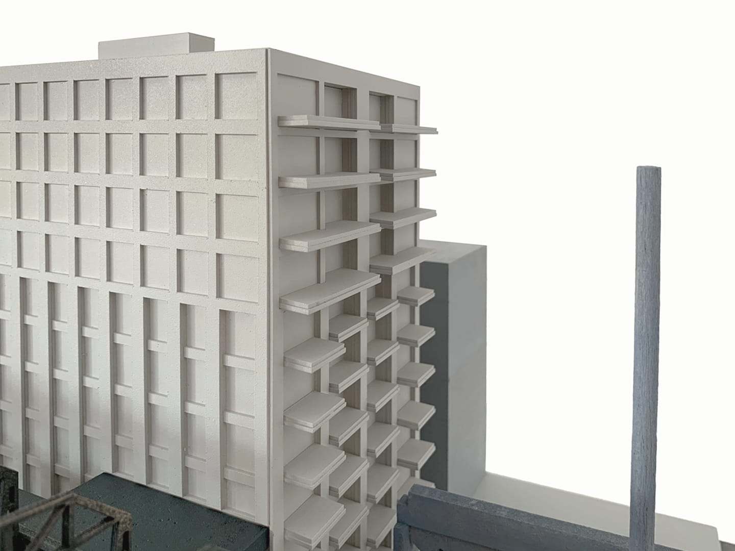 The tower with its horizontal balconies, three-quarter view