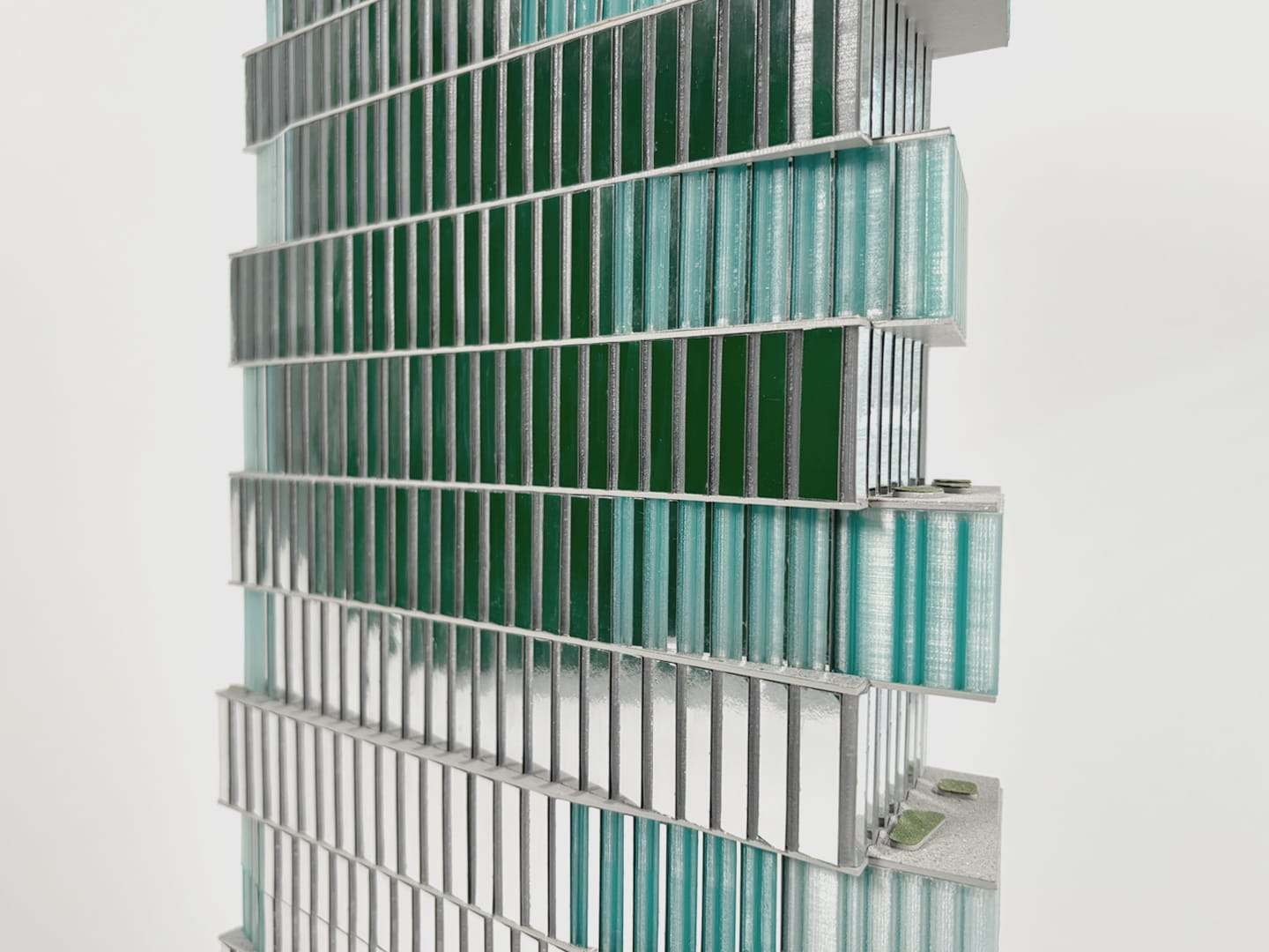 1:300 model of the Raquet Club tower: shifting floors clad in aluminium and blue glass
