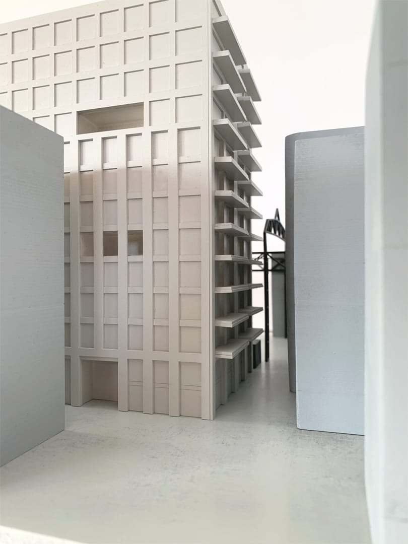 The De Draaier model seen from street level, between the two neighbouring volumes