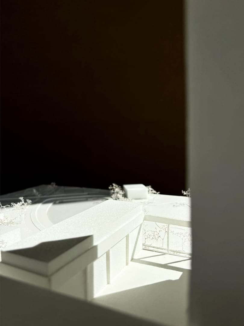 A low view over the plinth in sharp sunlight