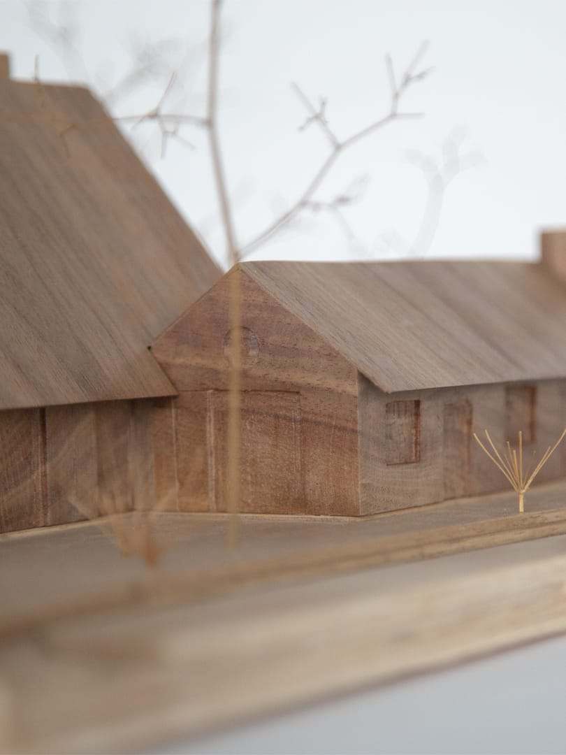 Close-up of the eaves, with the grain running through the solid wood