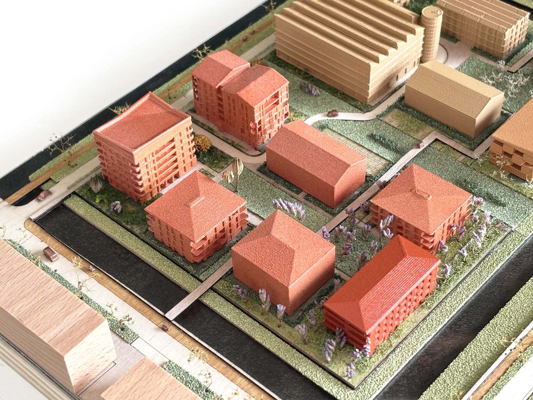 Aerial view of the Lincolnpark model with red-orange apartment buildings and houses