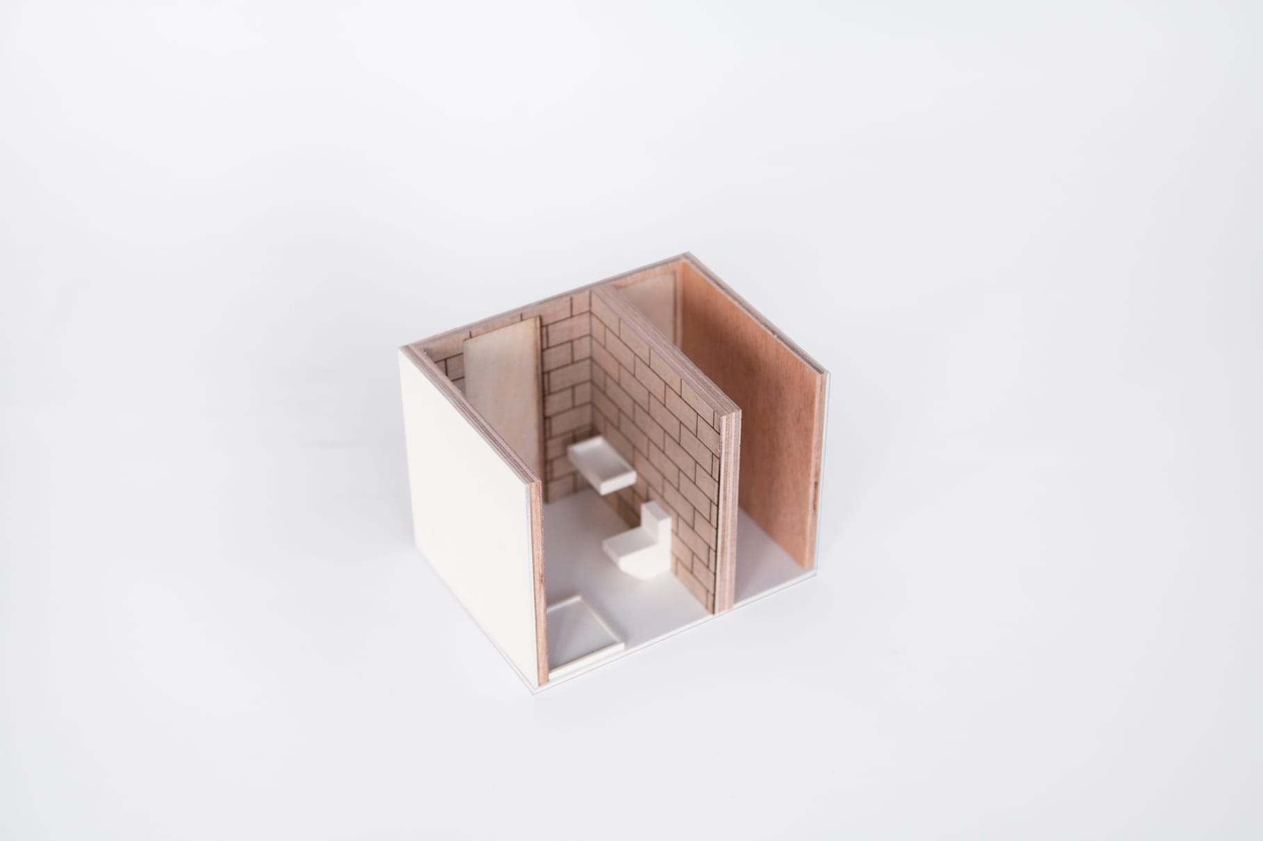 Detail model of a bathroom in plywood and tile, seen from above