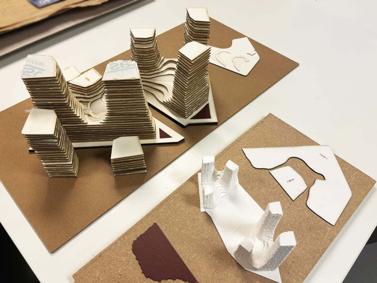Study models of the towers and the plinth on cork boards