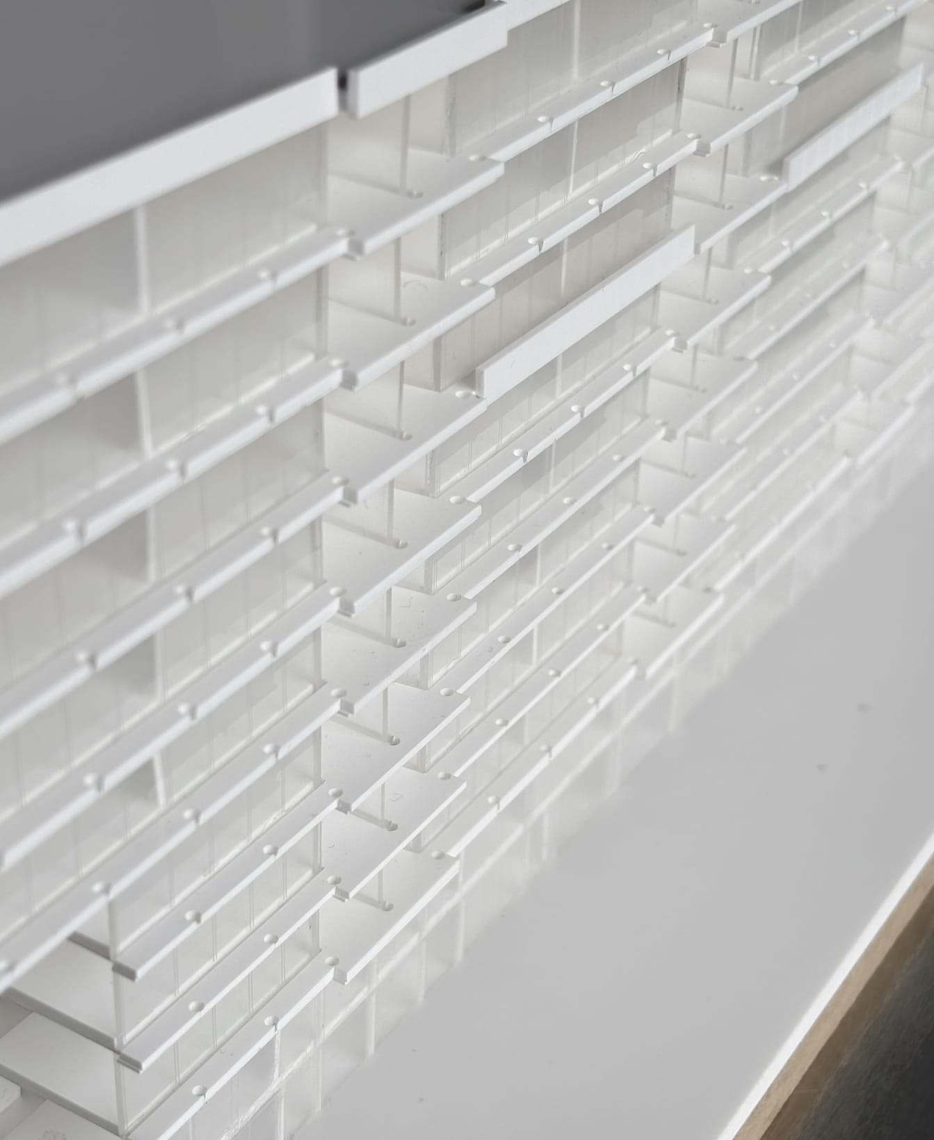 Detail of the white acrylic balconies and floors of the Güterbahnhof facade