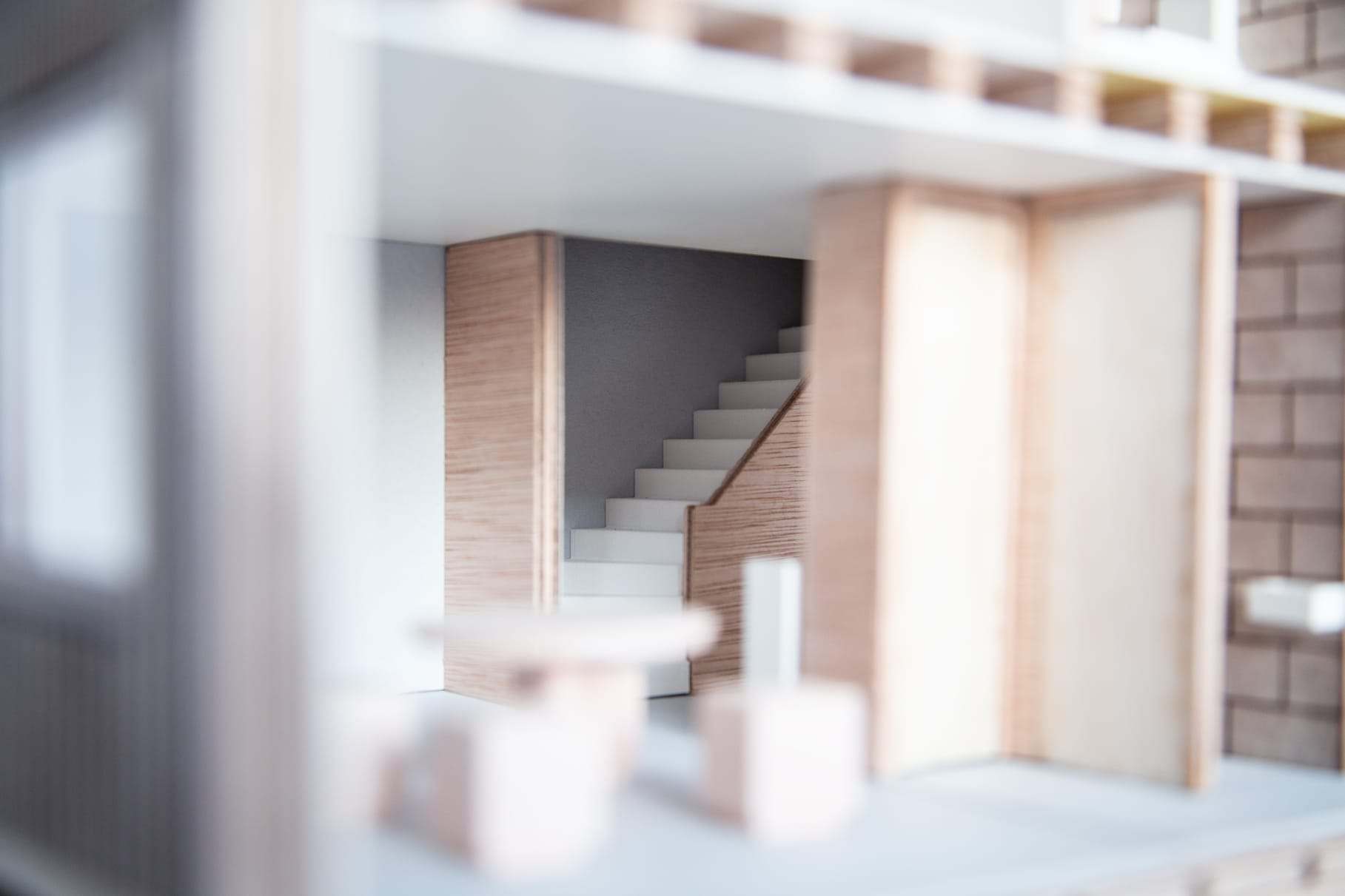 Detail of the interior stair, photographed through the open side of the model
