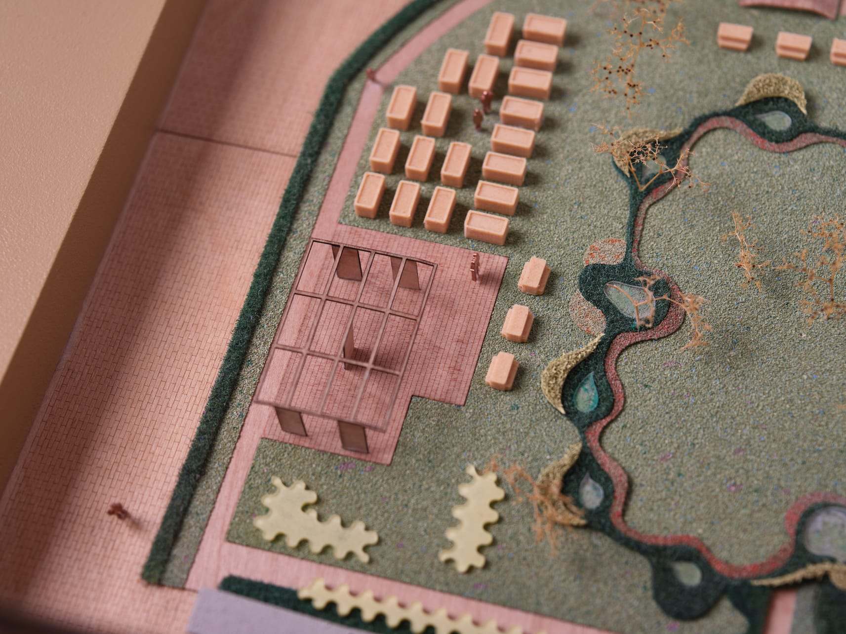 Aerial detail of the De Bundel courtyard garden with its winding path and small buildings