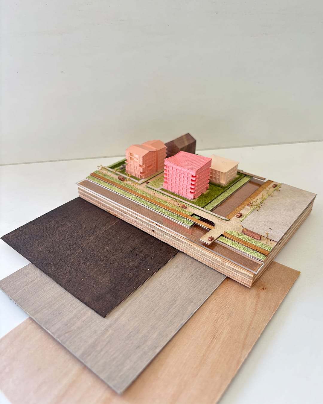 A finished section of the plan on top of the plywood samples
