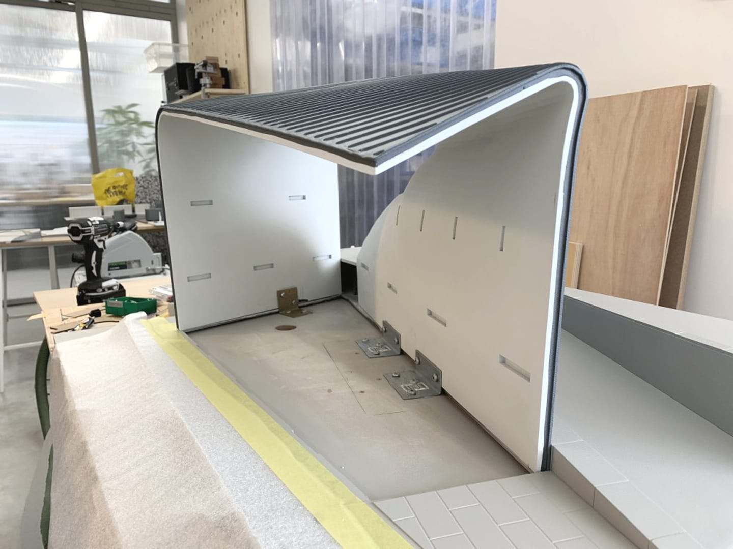 The curved roof and walls of the ARCAM model in the workshop