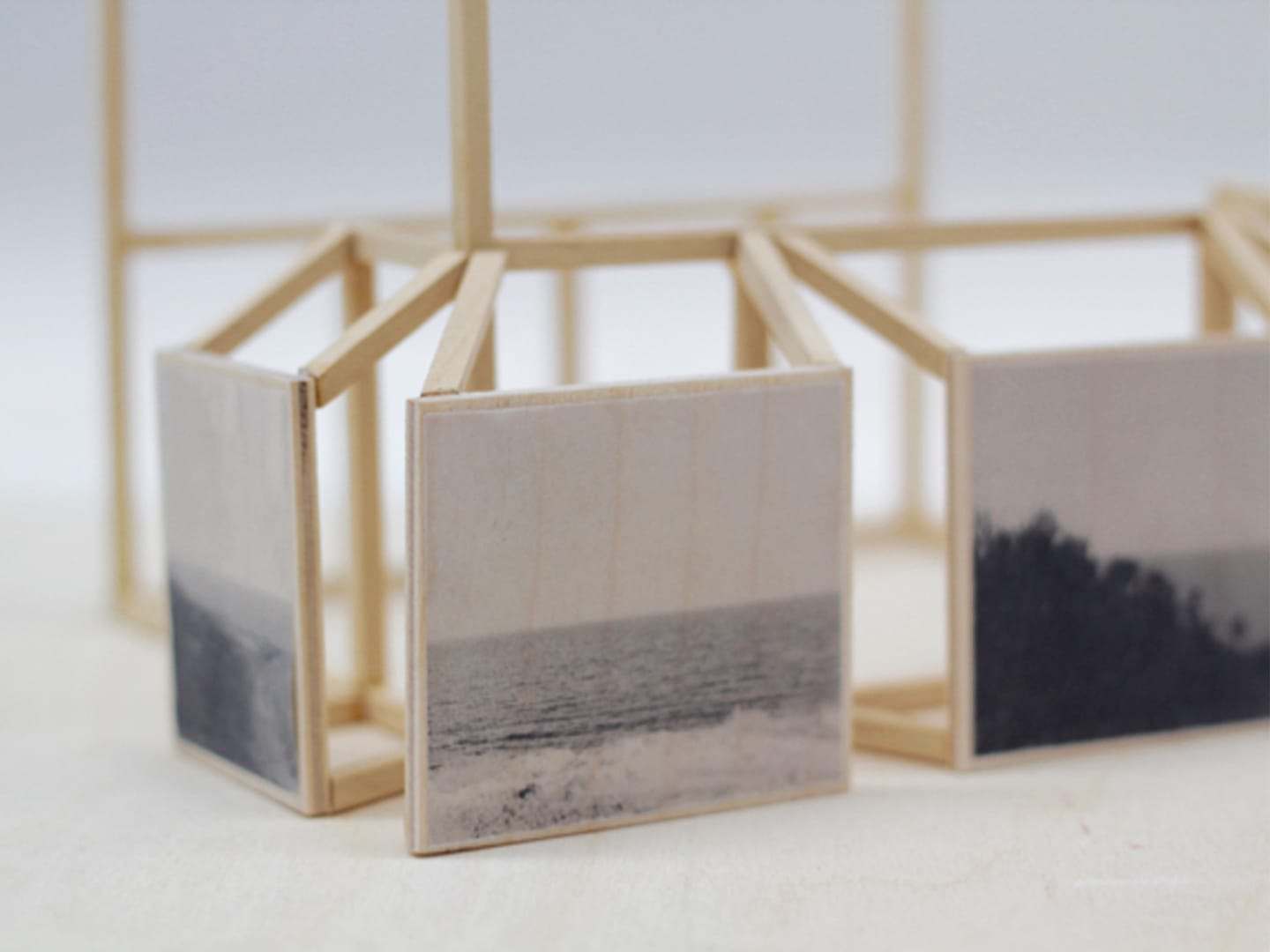 Wooden frames holding photographic images of the Mallorcan sea