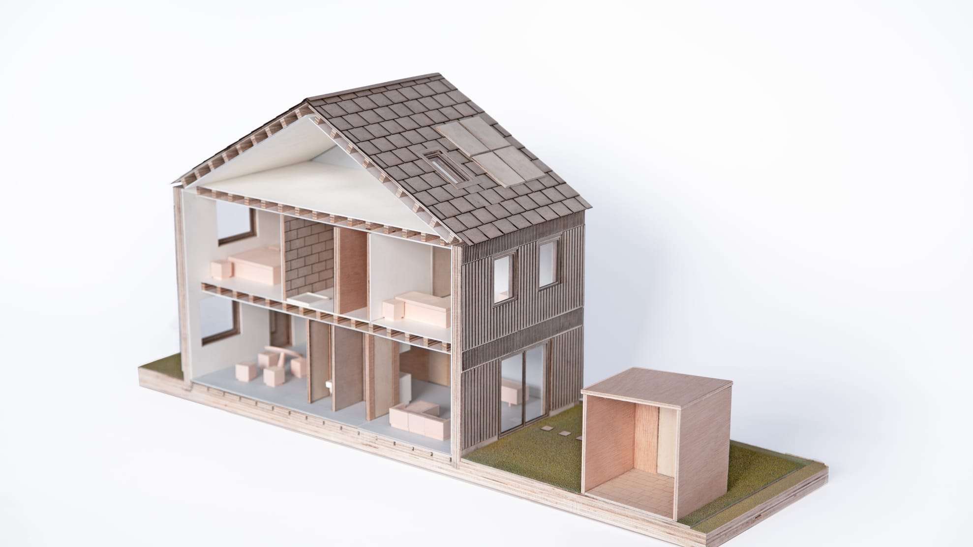Cutaway of the model showing both floors and the furnished rooms