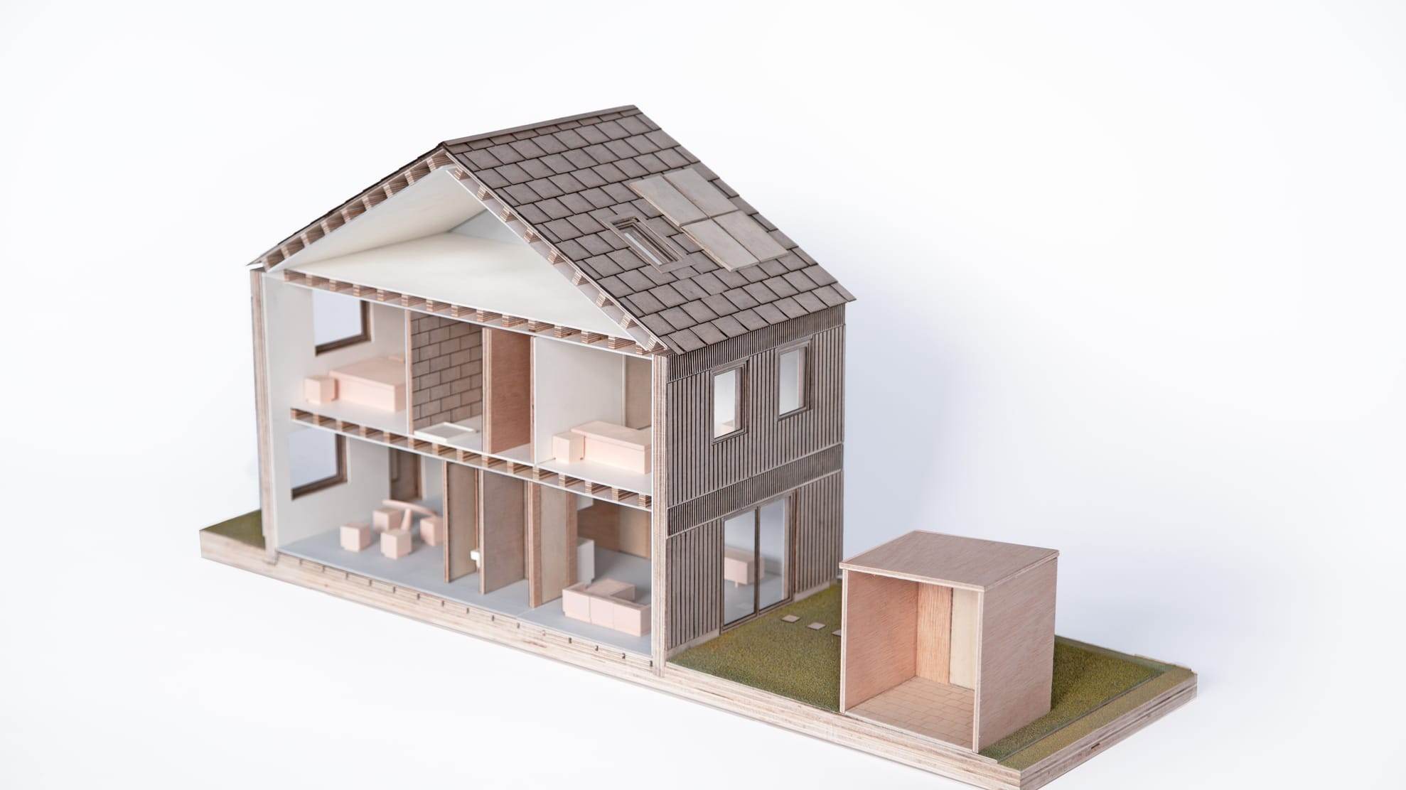 Cutaway of the model showing both floors and the furnished rooms