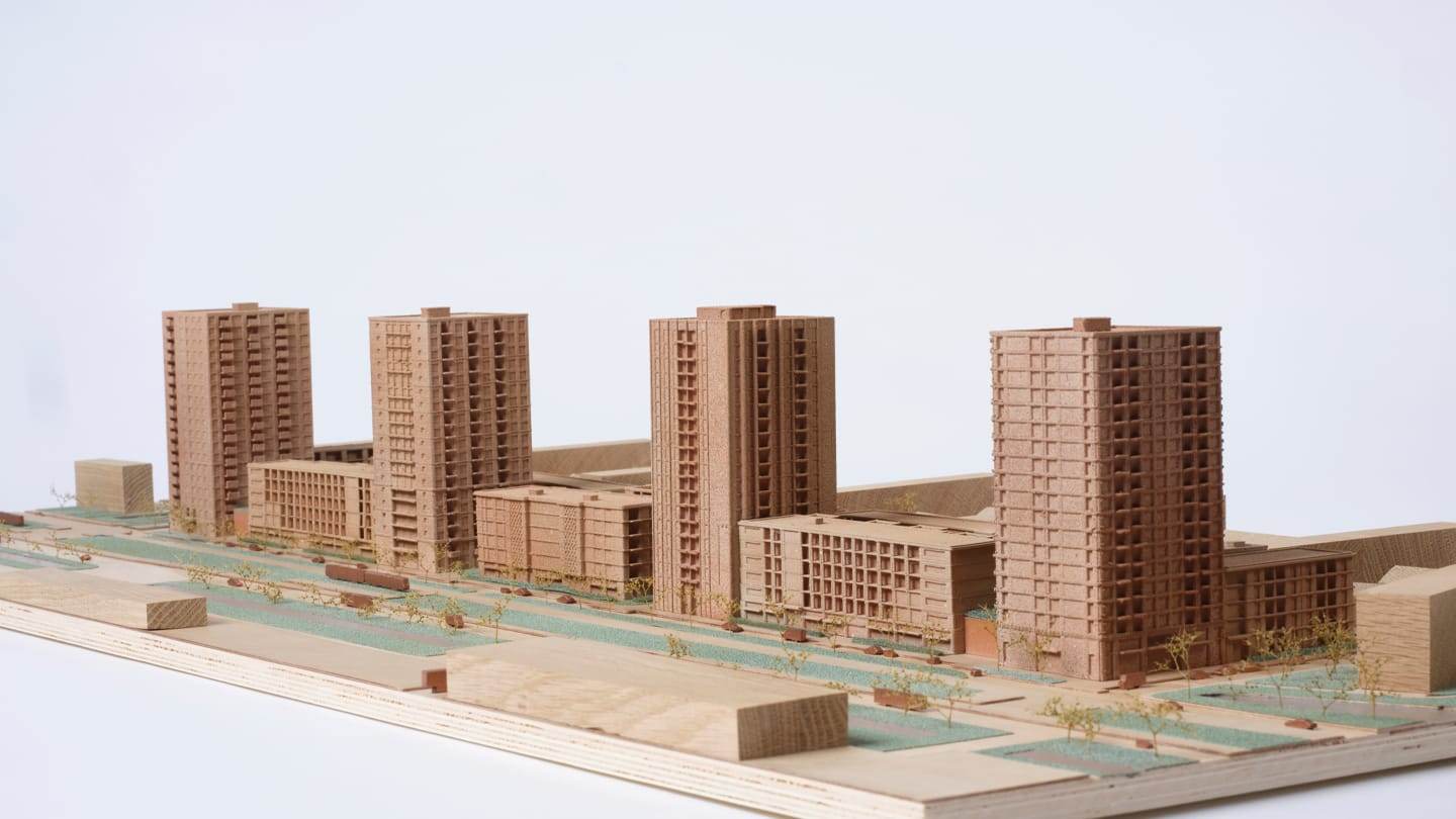 Three-quarter view with the towers and the boulevard between them