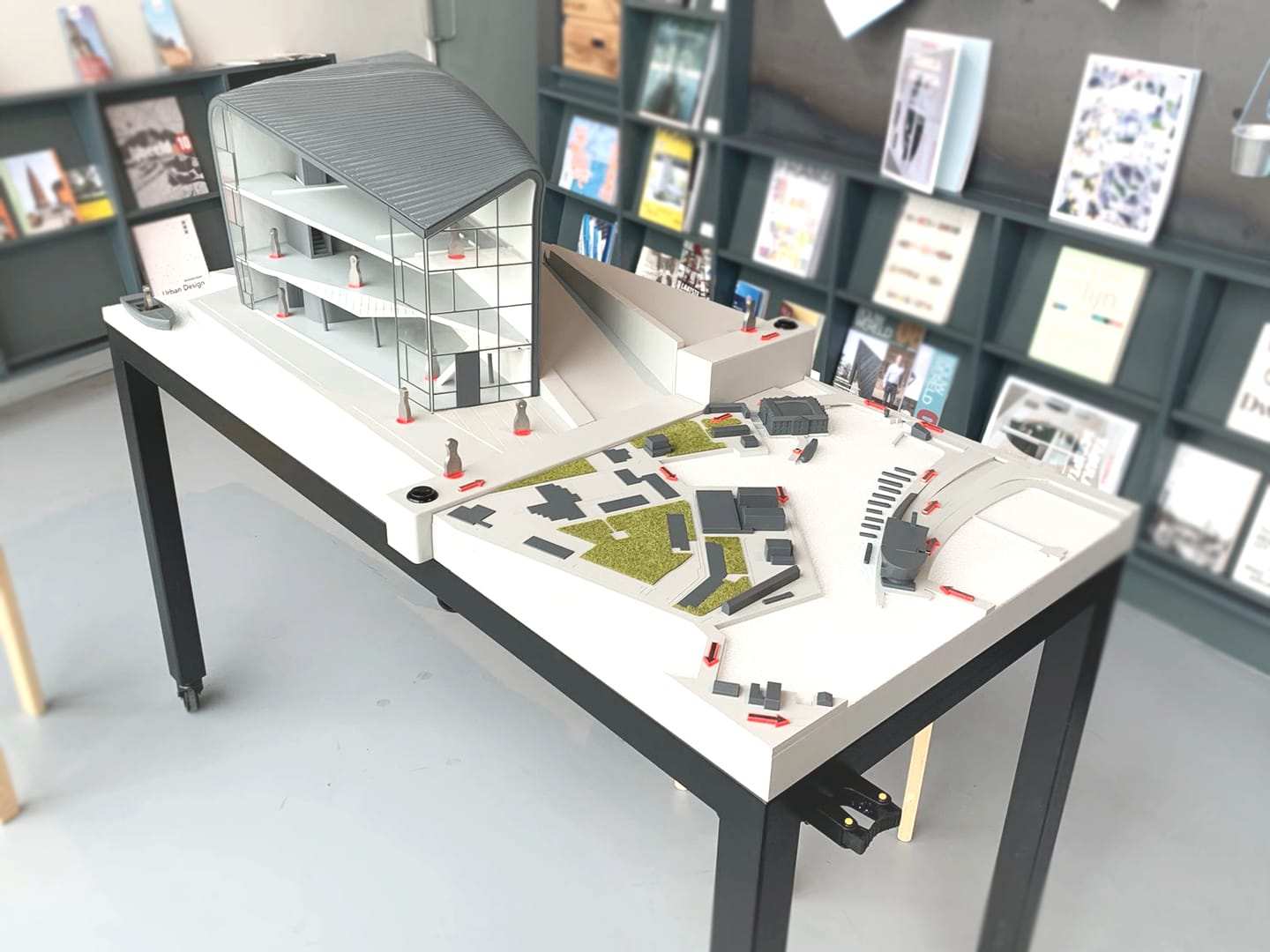 The tactile model on a table in the gallery, exhibition panels behind